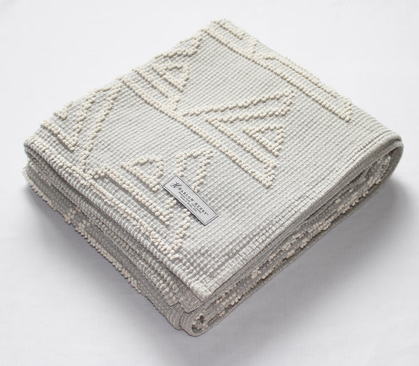 Triangles Cotton Throw in Grey/Natural